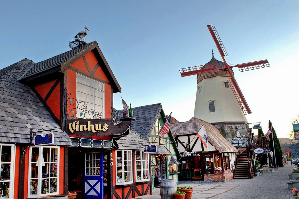 Danish-style storefronts and a windmill in the town of Solvang, not the care residence